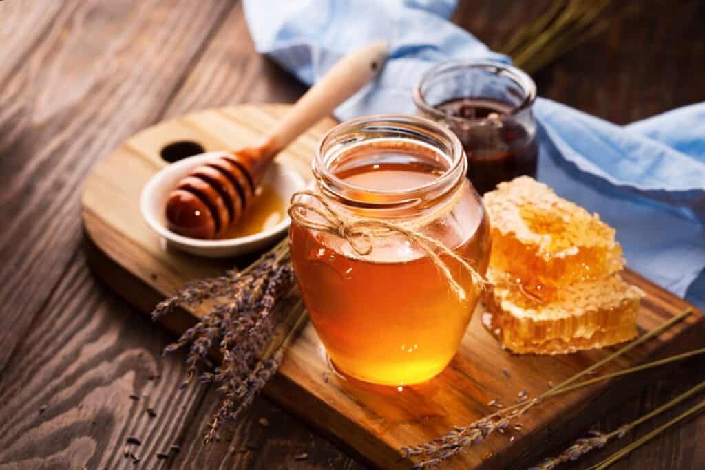 honey in jar on board