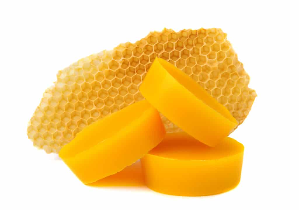 bees wax with comb in the background