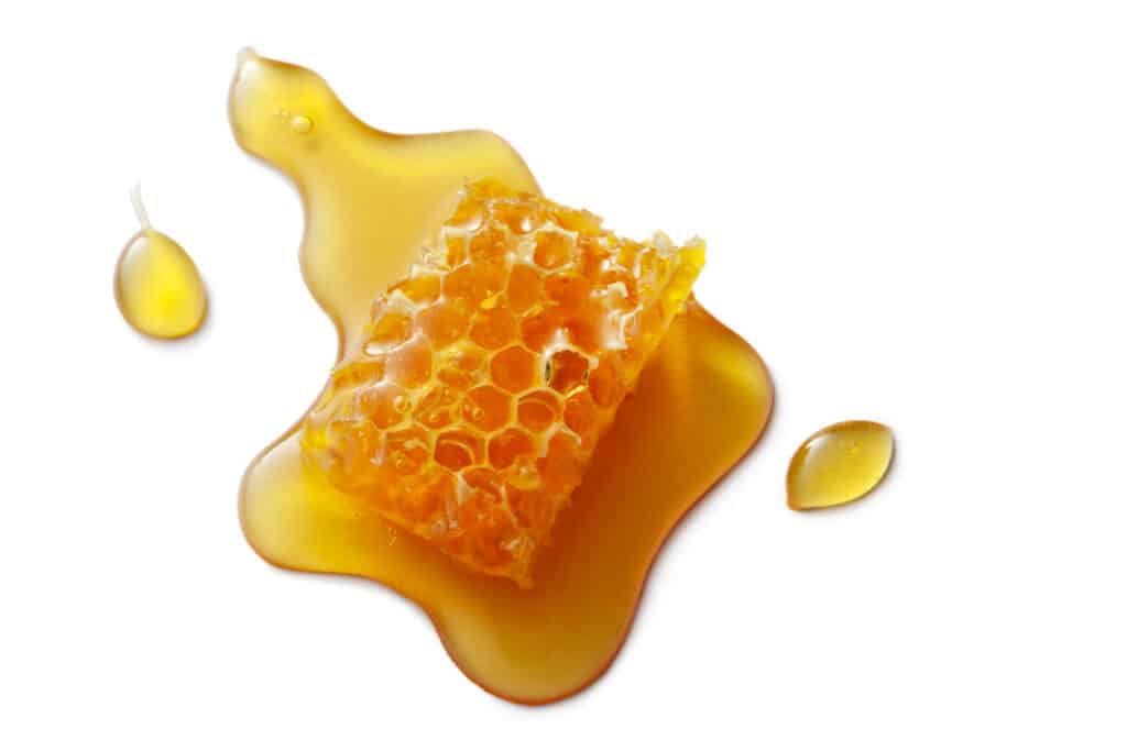 honey comb with honey around it
