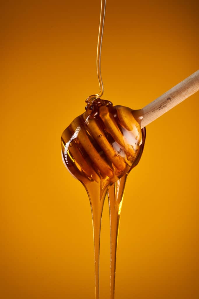 honey dripping from wand