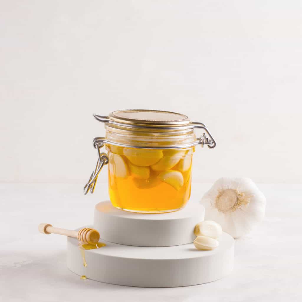 honey in a jar with fruit